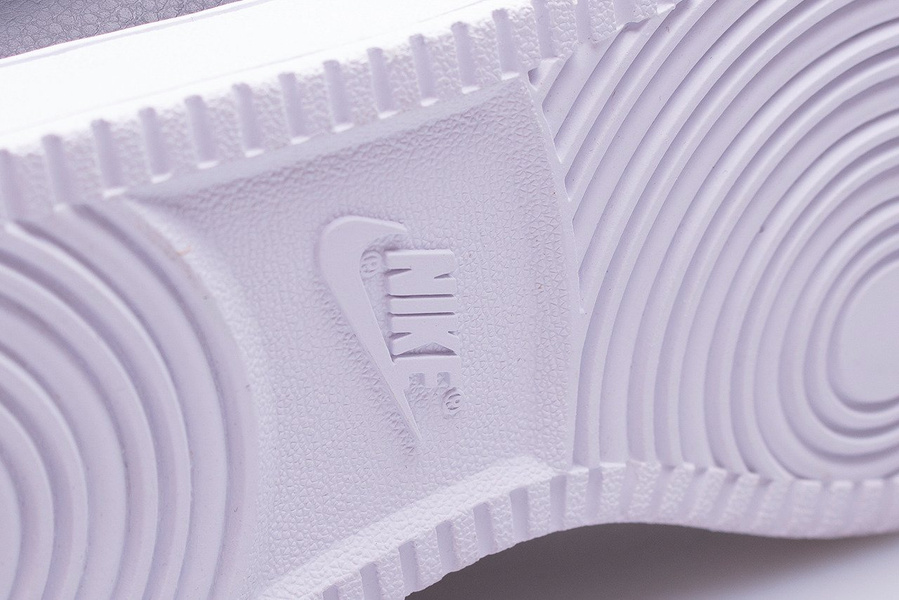 Buty damskie NIKE WMNS EBERNON MID AQ1778-001