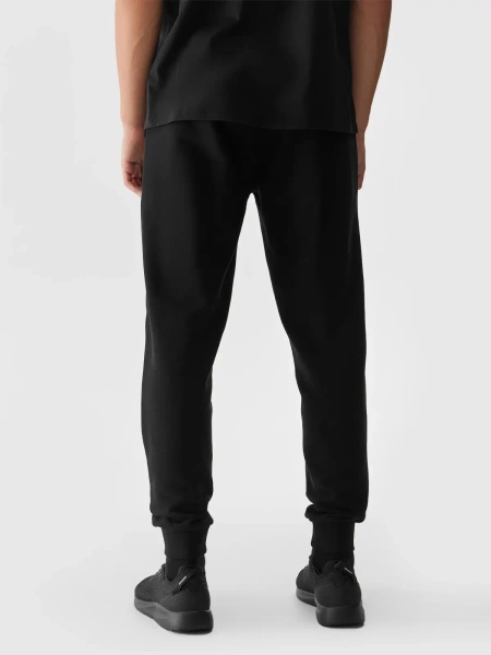 Spodnie dresowe męskie 4F 4FWSS24TTROM603-20S 